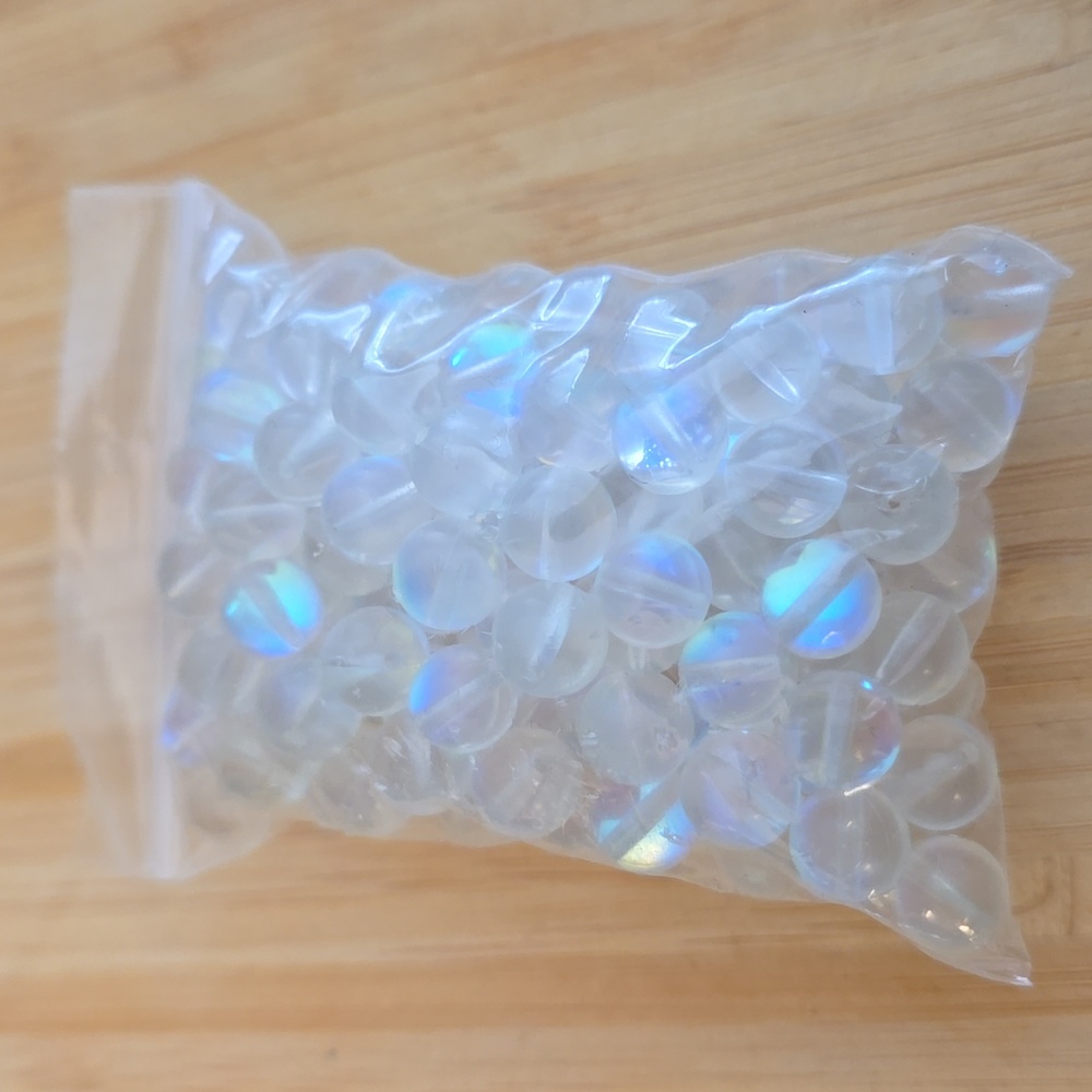 8mm Shimmery Glass beads (man made material)